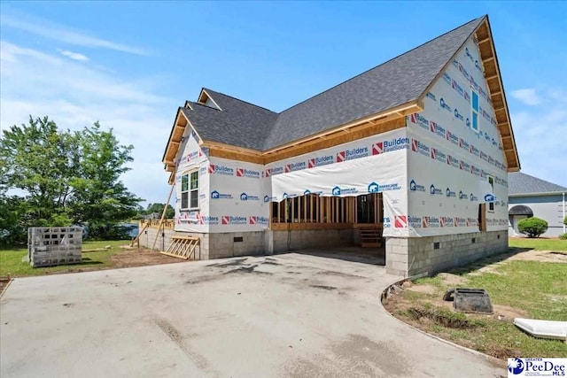 1005 Tunbridge Pl, Florence, SC 29501 - view of property exterior featuring a shingled roof and crawl space