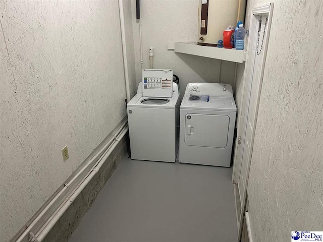 laundry room featuring washer and clothes dryer