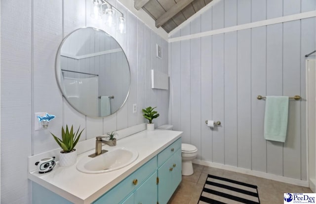 bathroom featuring vaulted ceiling with beams, tile patterned flooring, vanity, walk in shower, and toilet