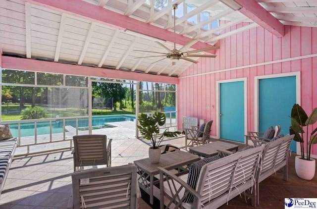 view of patio featuring ceiling fan and a pergola