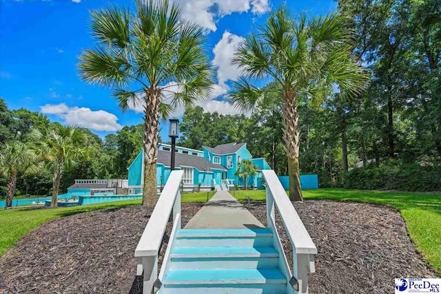 view of play area featuring a pool