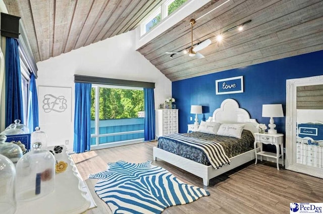bedroom featuring lofted ceiling, ceiling fan, access to exterior, hardwood / wood-style floors, and wooden ceiling