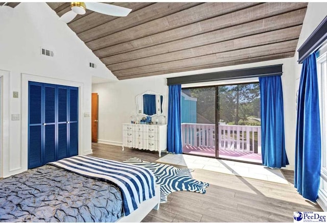 bedroom featuring wood ceiling, high vaulted ceiling, ceiling fan, access to exterior, and hardwood / wood-style floors