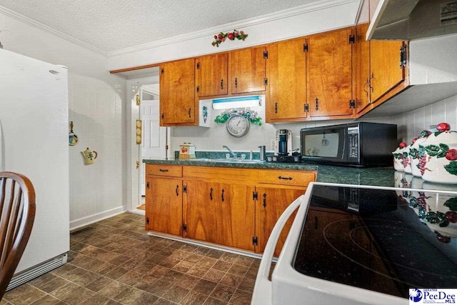 kitchen featuring sink, electric range, white refrigerator, ornamental molding, and wall chimney range hood