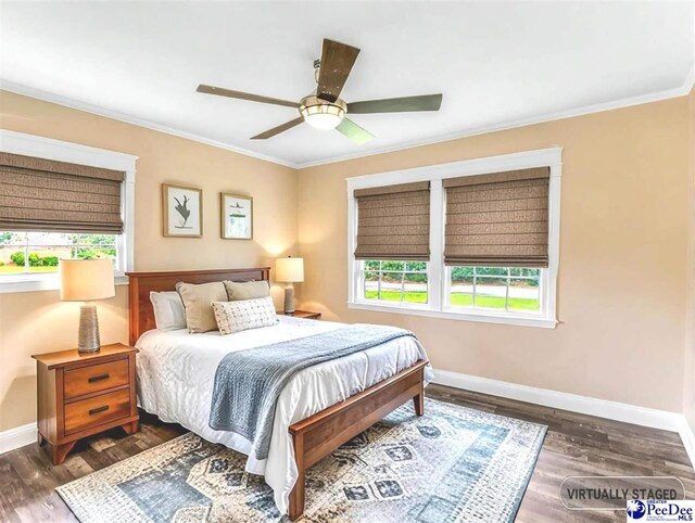 1341 Marshall Ave, Florence, SC 29501 - bedroom featuring ornamental molding, baseboards, wood finished floors, and a ceiling fan