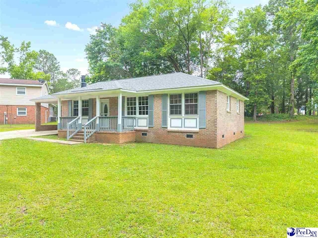 1341 Marshall Ave, Florence, SC 29501 - view of front of house featuring covered porch, crawl space, and a front yard