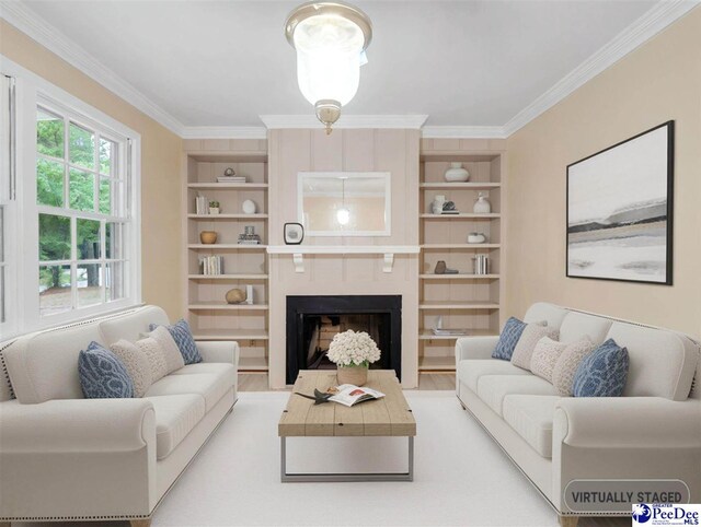 1341 Marshall Ave, Florence, SC 29501 - living room featuring built in features, crown molding, wood finished floors, and a fireplace