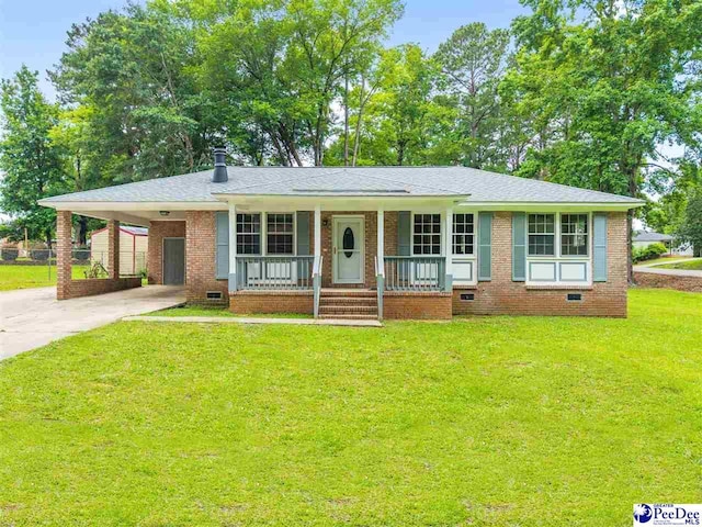 1341 Marshall Ave, Florence, SC 29501 - view of front of property featuring covered porch, concrete driveway, brick siding, a front lawn, and an attached carport