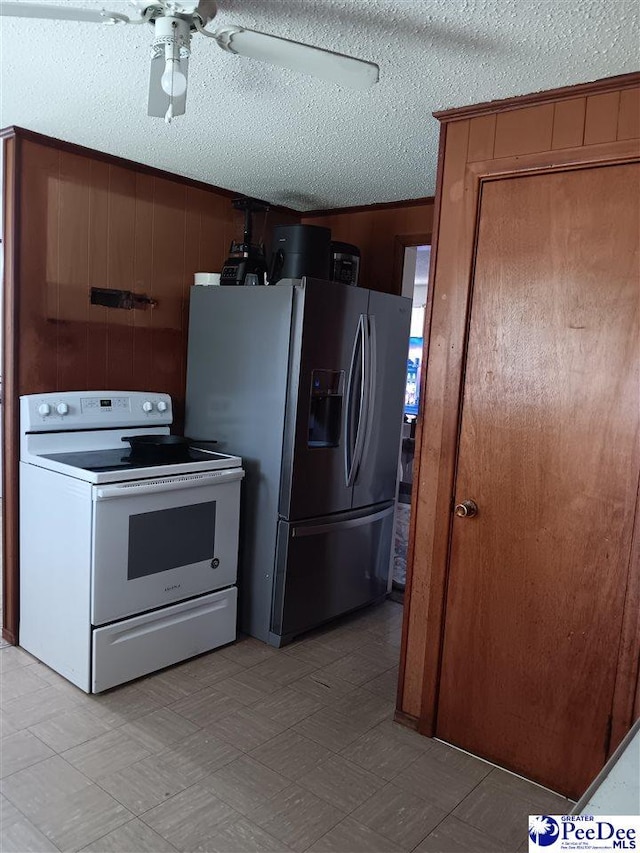 702 New Hampton Rd, Hartsville, SC 29550 - kitchen featuring white electric range, stainless steel fridge, a textured ceiling, a ceiling fan, and light flooring