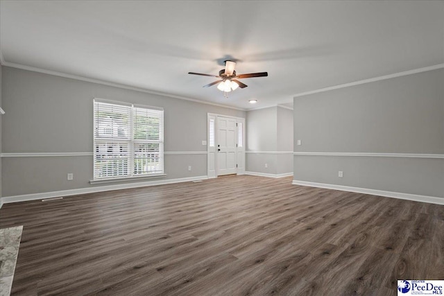 841 W Mallard Hen, Florence, SC 29505 - unfurnished living room with ornamental molding, a ceiling fan, baseboards, and dark wood finished floors