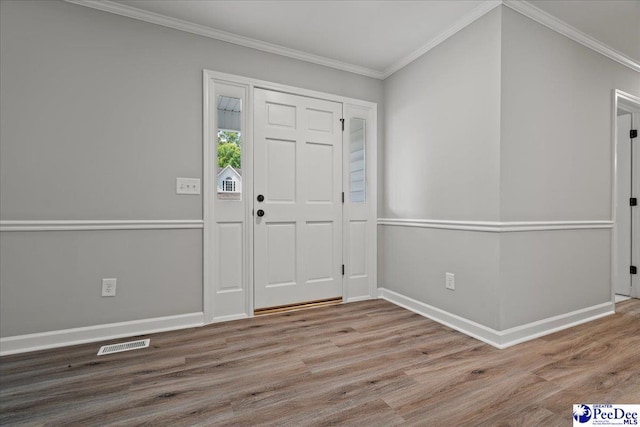 841 W Mallard Hen, Florence, SC 29505 - entryway featuring wood finished floors, baseboards, and ornamental molding