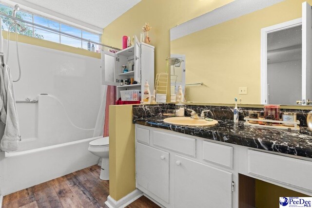 711A8 Coventry Ln, Florence, SC 29501 - full bathroom with wood finished floors, vanity, toilet, and shower / bathtub combination