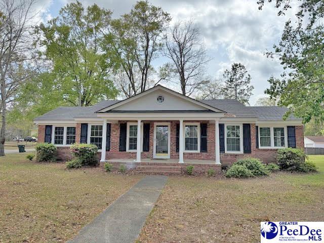 270 Quinby Cir, Quinby, SC 29506 - view of front of home with brick siding and covered porch