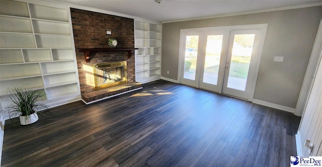 unfurnished living room featuring dark hardwood / wood-style flooring, built in features, a fireplace, and ornamental molding