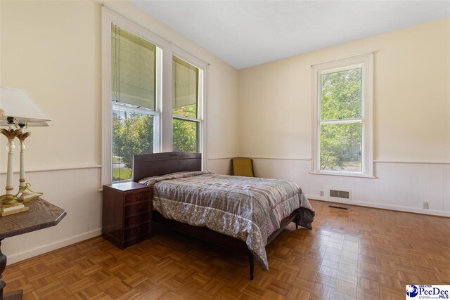 118 Ford Ave, Mullins, SC 29574 - bedroom with wainscoting and baseboards