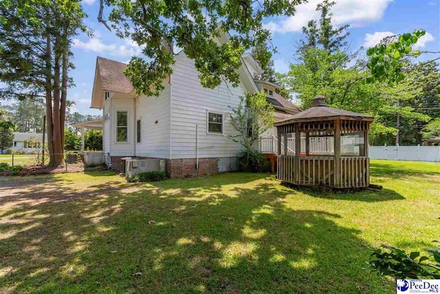 118 Ford Ave, Mullins, SC 29574 - back of house with a gazebo, central AC unit, and crawl space