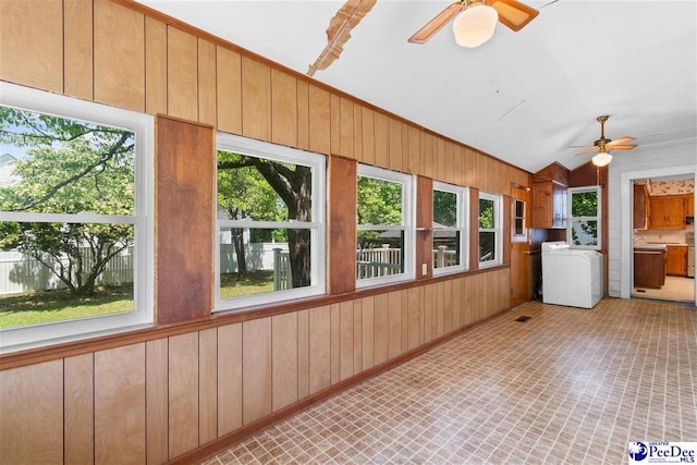 118 Ford Ave, Mullins, SC 29574 - unfurnished sunroom with washer / clothes dryer, wooden walls, and lofted ceiling