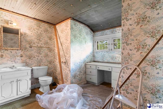 118 Ford Ave, Mullins, SC 29574 - bathroom featuring wallpapered walls, vanity, wooden ceiling, toilet, and ornamental molding