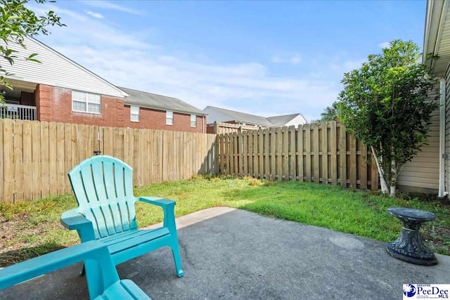 484 Londonberry, Florence, SC 29505 - fenced backyard featuring a patio