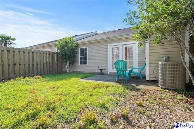 484 Londonberry, Florence, SC 29505 - back of property featuring a patio area and a fenced backyard