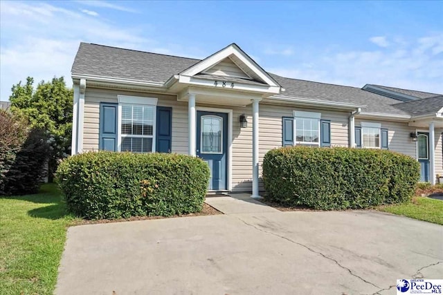 484 Londonberry, Florence, SC 29505 - view of front of house with a front lawn and a shingled roof