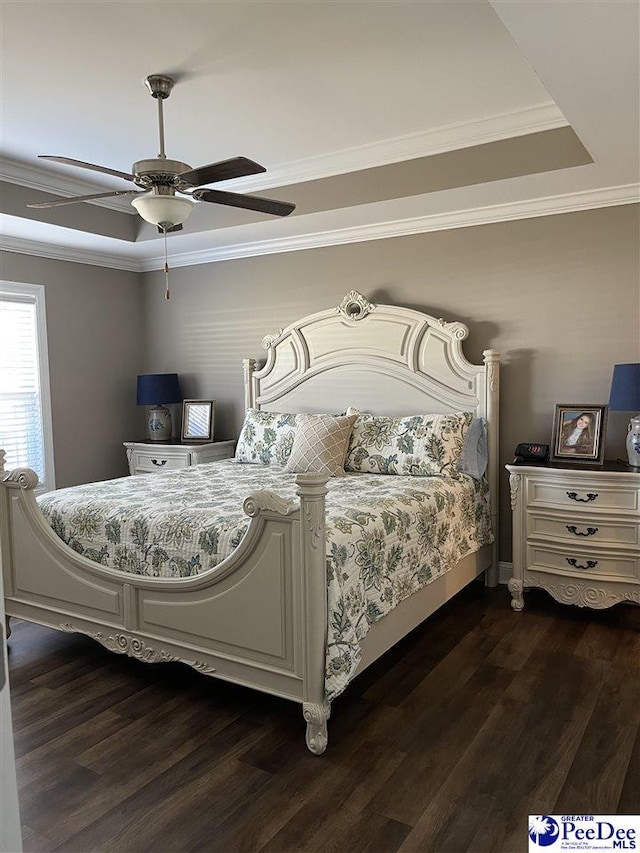 bedroom with ceiling fan, ornamental molding, and dark hardwood / wood-style flooring