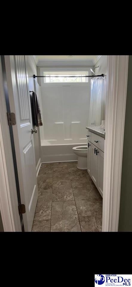 full bathroom with toilet, vanity, and shower / bathtub combination with curtain