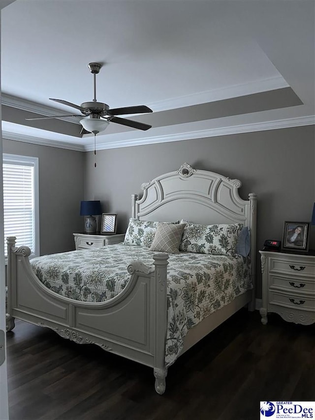 bedroom with crown molding, dark wood-type flooring, and ceiling fan