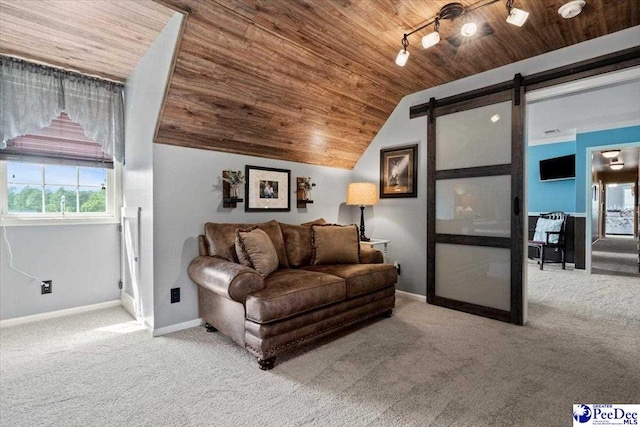 living room featuring wood ceiling, carpet flooring, a barn door, lofted ceiling, and baseboards