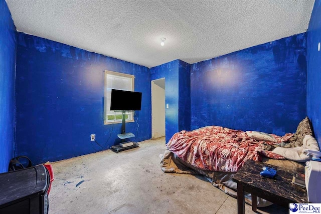 903 N Park St, Mullins, SC 29574 - bedroom featuring a textured ceiling and unfinished concrete floors