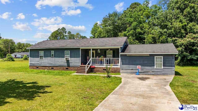 903 N Park St, Mullins, SC 29574 - ranch-style home featuring crawl space, a porch, a front yard, driveway, and roof with shingles