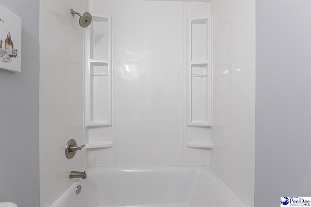 bathroom featuring tub / shower combination