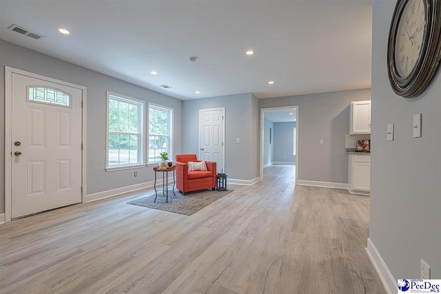 living area featuring light hardwood / wood-style floors