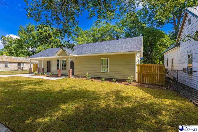 view of front of home with a front lawn