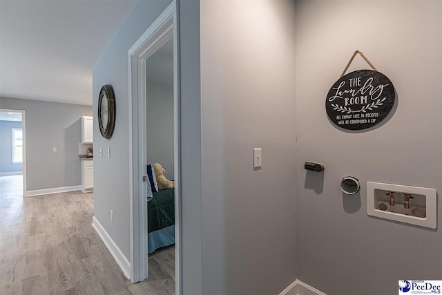 hallway featuring light hardwood / wood-style floors