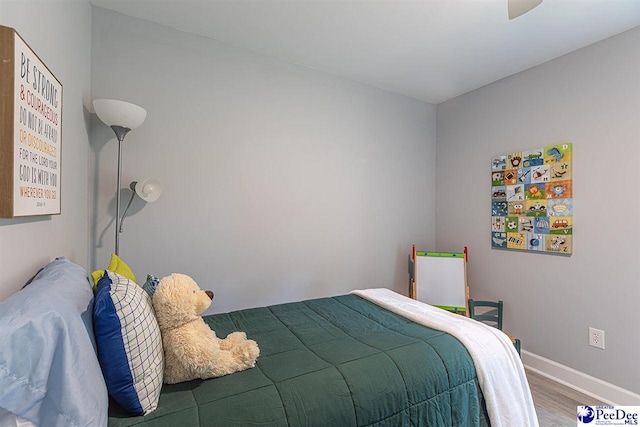 bedroom featuring wood-type flooring