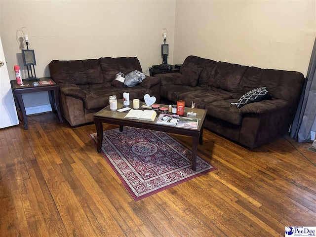 living area with wood-type flooring