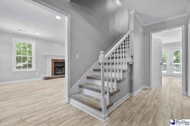 112 Gann Dr, Darlington, SC 29532 - stairway featuring wood finished floors, a fireplace, ornamental molding, baseboards, and recessed lighting