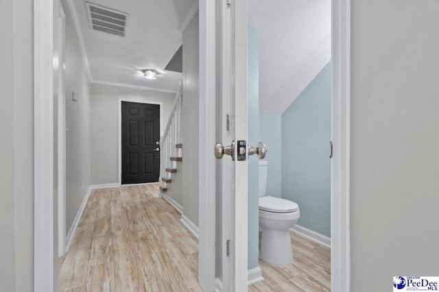 112 Gann Dr, Darlington, SC 29532 - bathroom featuring toilet, wood finished floors, baseboards, and crown molding