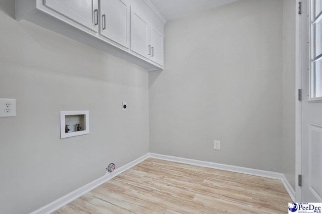 112 Gann Dr, Darlington, SC 29532 - washroom with cabinet space, hookup for a washing machine, hookup for an electric dryer, light wood-style floors, and baseboards