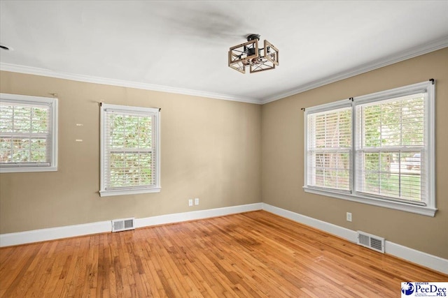 516 S Cashua Dr, Florence, SC 29501 - empty room with crown molding and light wood-type flooring