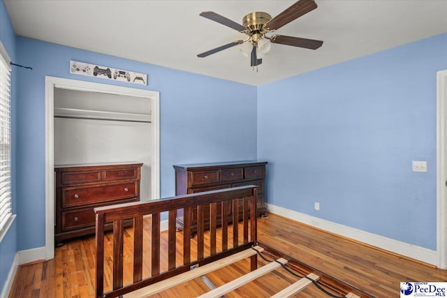 516 S Cashua Dr, Florence, SC 29501 - bedroom with wood finished floors and a ceiling fan