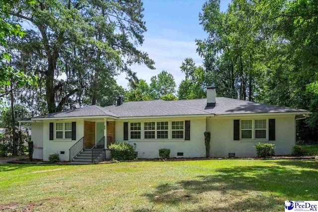 516 S Cashua Dr, Florence, SC 29501 - ranch-style home featuring crawl space, a front lawn, and a chimney