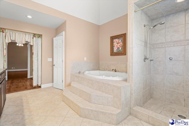 302 Cashua St, Darlington, SC 29532 - full bath with a garden tub, a tile shower, tile patterned floors, vanity, and baseboards