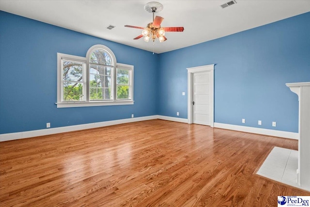 302 Cashua St, Darlington, SC 29532 - spare room with ceiling fan, wood finished floors, and baseboards