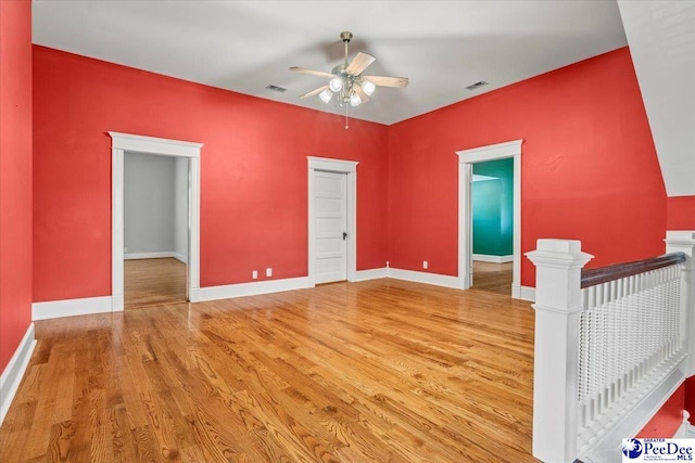 302 Cashua St, Darlington, SC 29532 - spare room with a ceiling fan, wood finished floors, and baseboards