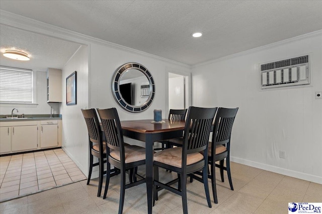 439 Whitman Ave, Florence, SC 29501 - dining area featuring a textured ceiling, a wall mounted air conditioner, and crown molding