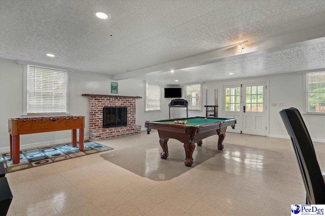 439 Whitman Ave, Florence, SC 29501 - rec room featuring a fireplace, recessed lighting, pool table, a textured ceiling, and tile patterned floors