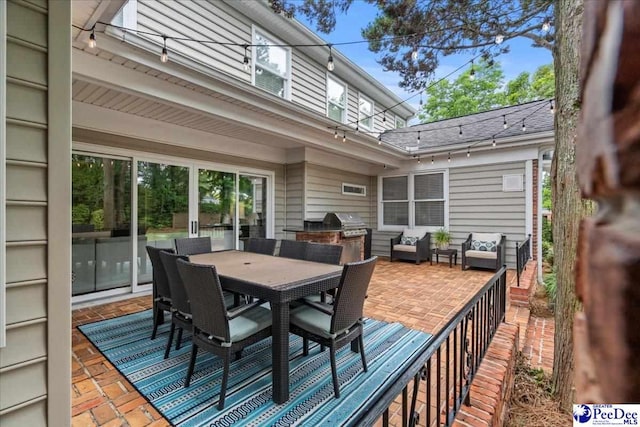 439 Whitman Ave, Florence, SC 29501 - wooden terrace featuring an outdoor hangout area, an outdoor kitchen, outdoor dining area, and a patio area