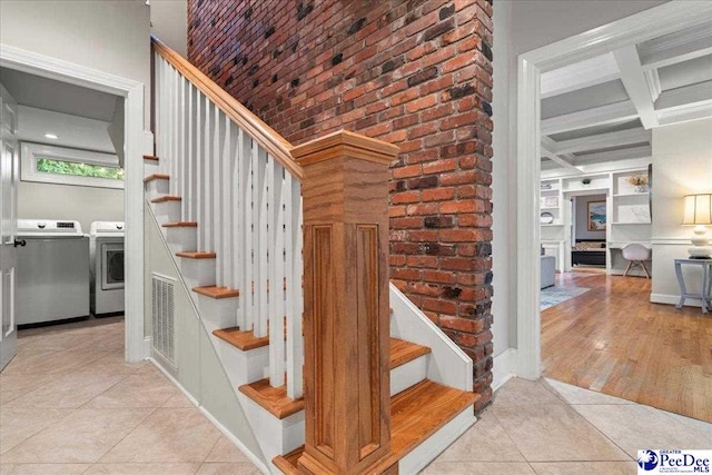 439 Whitman Ave, Florence, SC 29501 - stairway featuring washer and clothes dryer, tile patterned floors, coffered ceiling, and beam ceiling